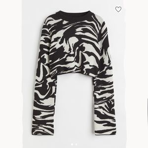 Jacquared Knit H&M sweater in the colour zebra, new with tags, size small